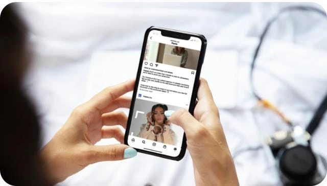 Caption for Instagram displayed beside a smartphone showing an Instagram post